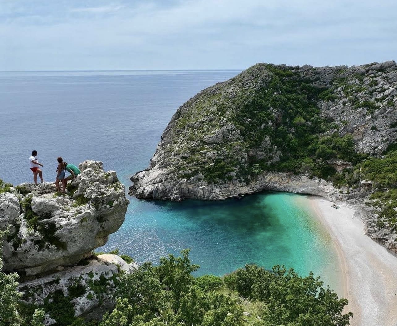 Turquoise cove and white pebble beach on the Karaburun coast